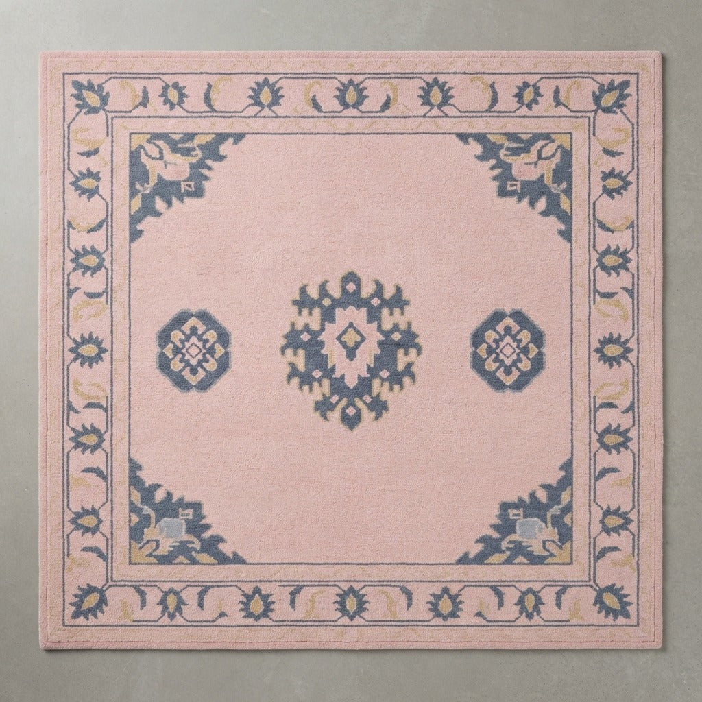 Blush Pink Chinese Art Deco Hand-Tufted Rug with Slate Blue Border - studio photo