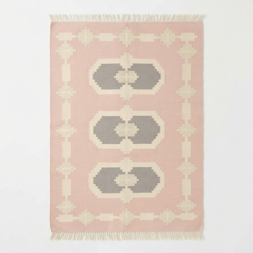 Blush Pink Cotton Flat Weave Rug with Grey Hexagon Medallions - studio photo
