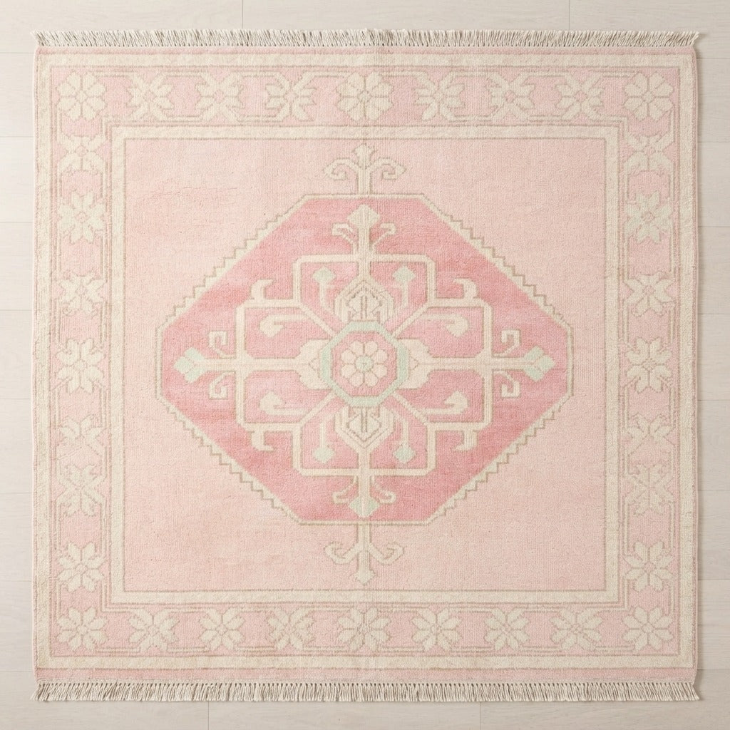Blush Pink Medallion Square Hand-Knotted Rug with Ivory Floral Border - studio photo