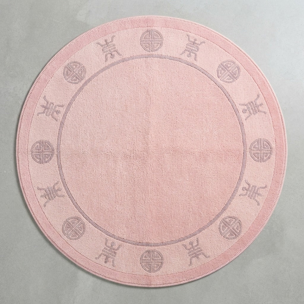 Blush Pink Round Hand-Knotted Rug with Mauve Shou Border - studio photo