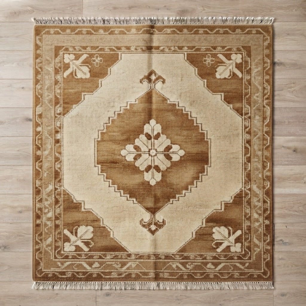 Camel and Cream Diamond Medallion Hand-Knotted Rug - studio photo