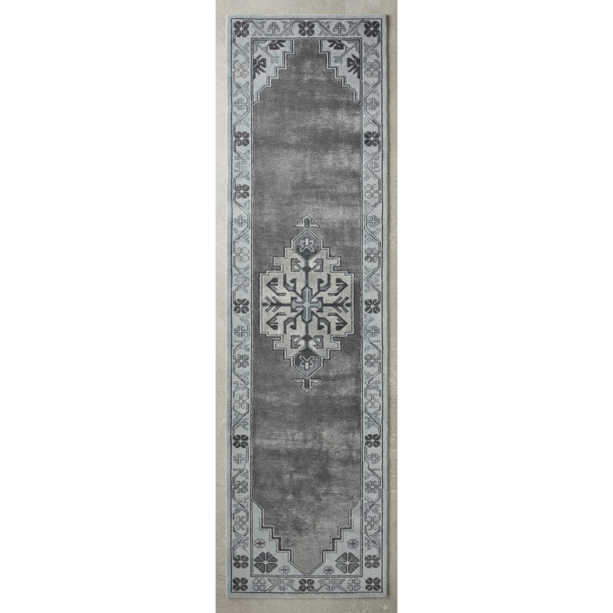 Charcoal Grey Distressed Medallion Hand-Tufted Runner with Powder Blue Border - studio photo