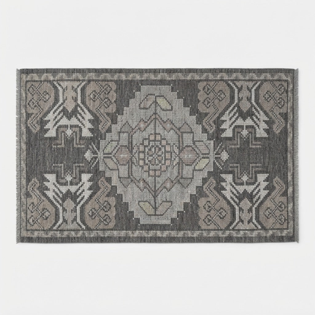Charcoal and Grey Tribal Medallion Hand-Knotted Rug - studio photo