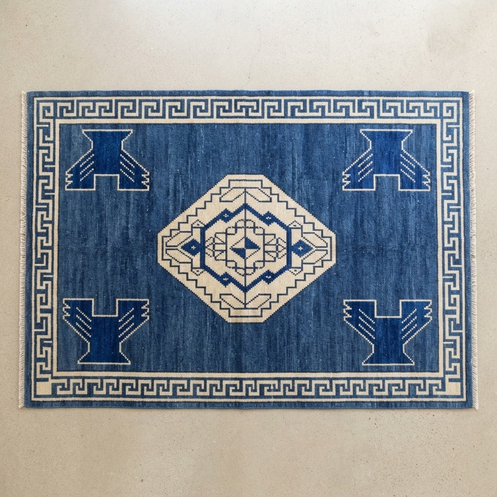 Cobalt Blue Medallion Hand-Knotted Rug with Ivory Greek Key Border - studio photo