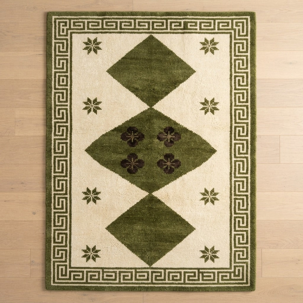 Cream Hand-Tufted Rug with Olive Diamonds and Greek Key Border - studio photo