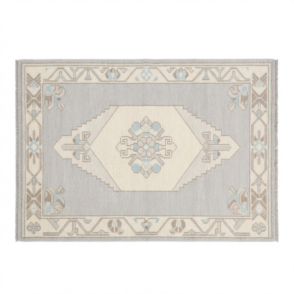 Dove Grey Hand-Knotted Rug with Ivory Medallion and Floral Border - studio photo