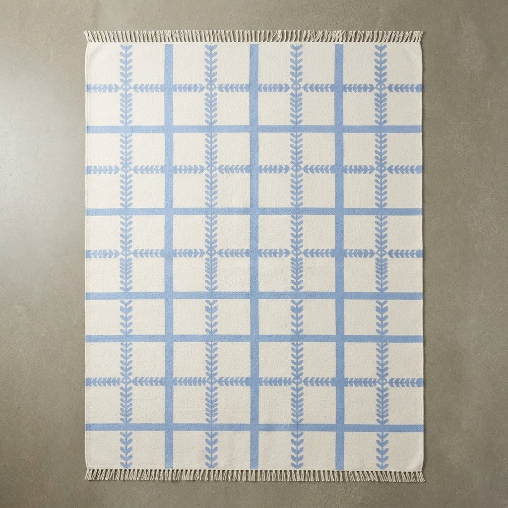 Ivory Cotton Flat Weave Rug with Powder Blue Windowpane Grid - studio photo
