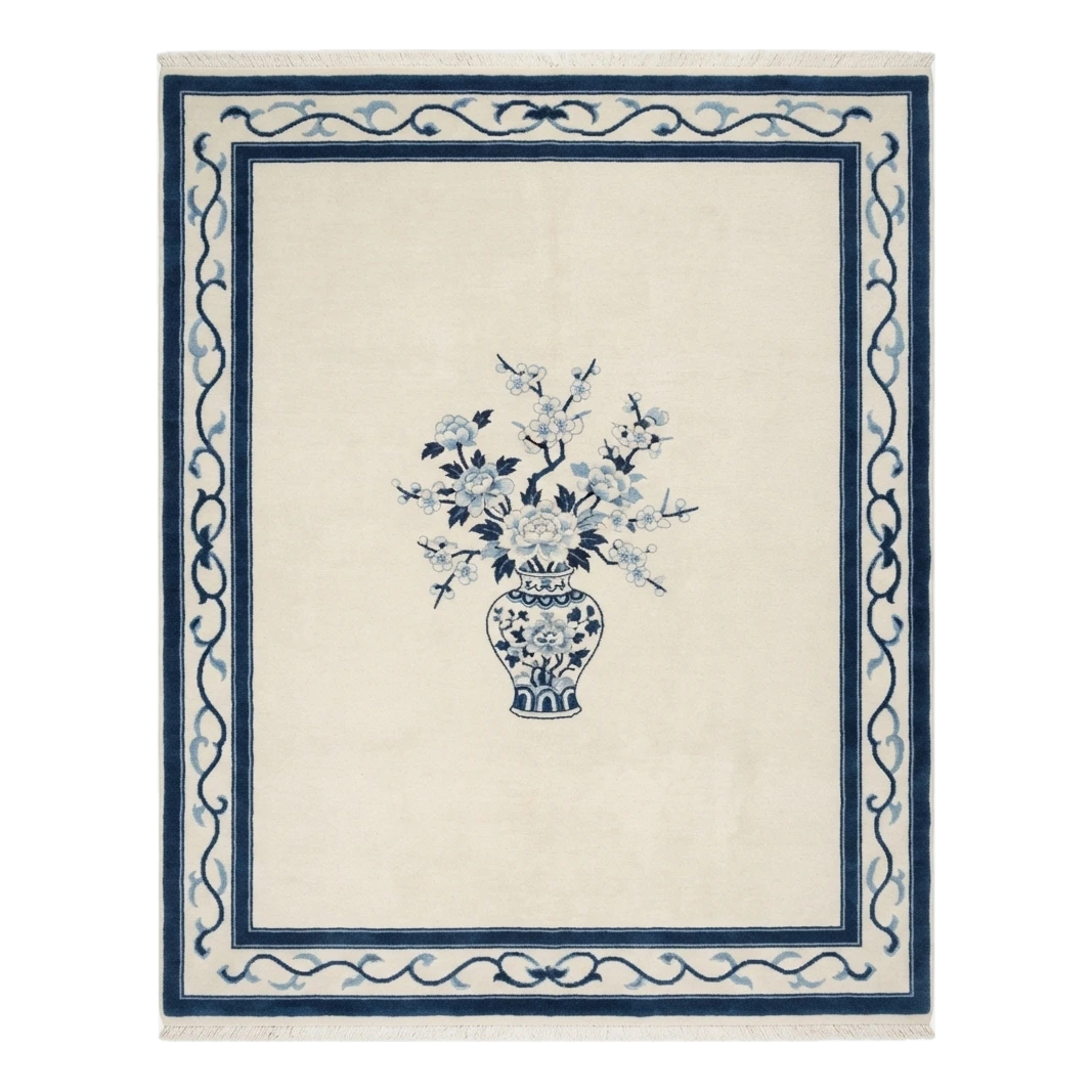 Ivory Hand-Knotted Rug with Navy Ribbon Border and Porcelain Vase