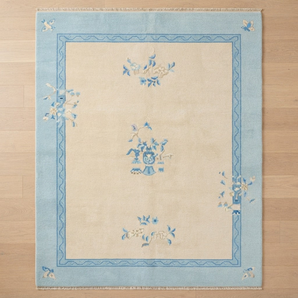 Ivory Hand-Knotted Rug with Powder Blue Border and Floral Sprays - studio photo
