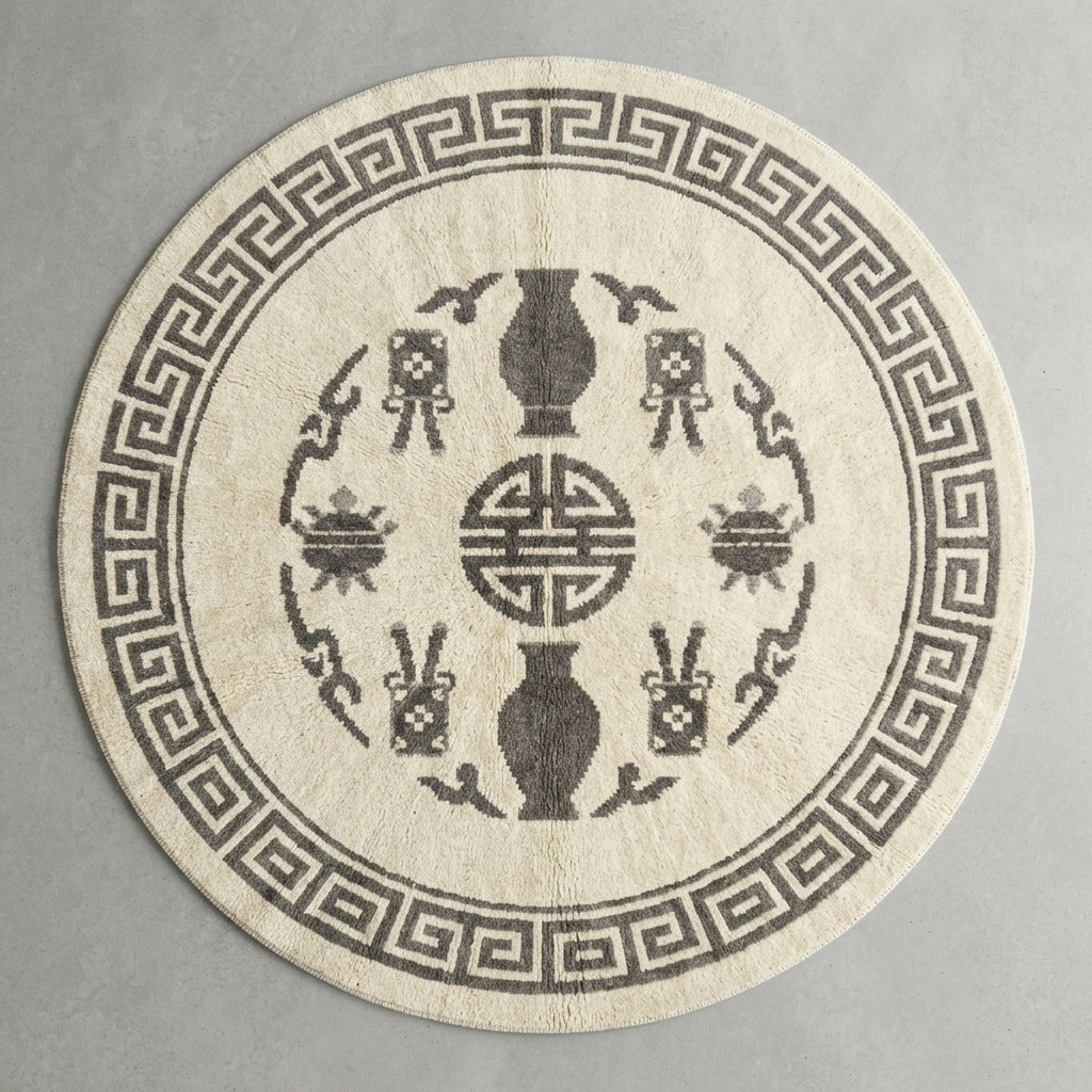 Ivory Round Hand-Knotted Rug with Charcoal Greek Key Border - studio photo