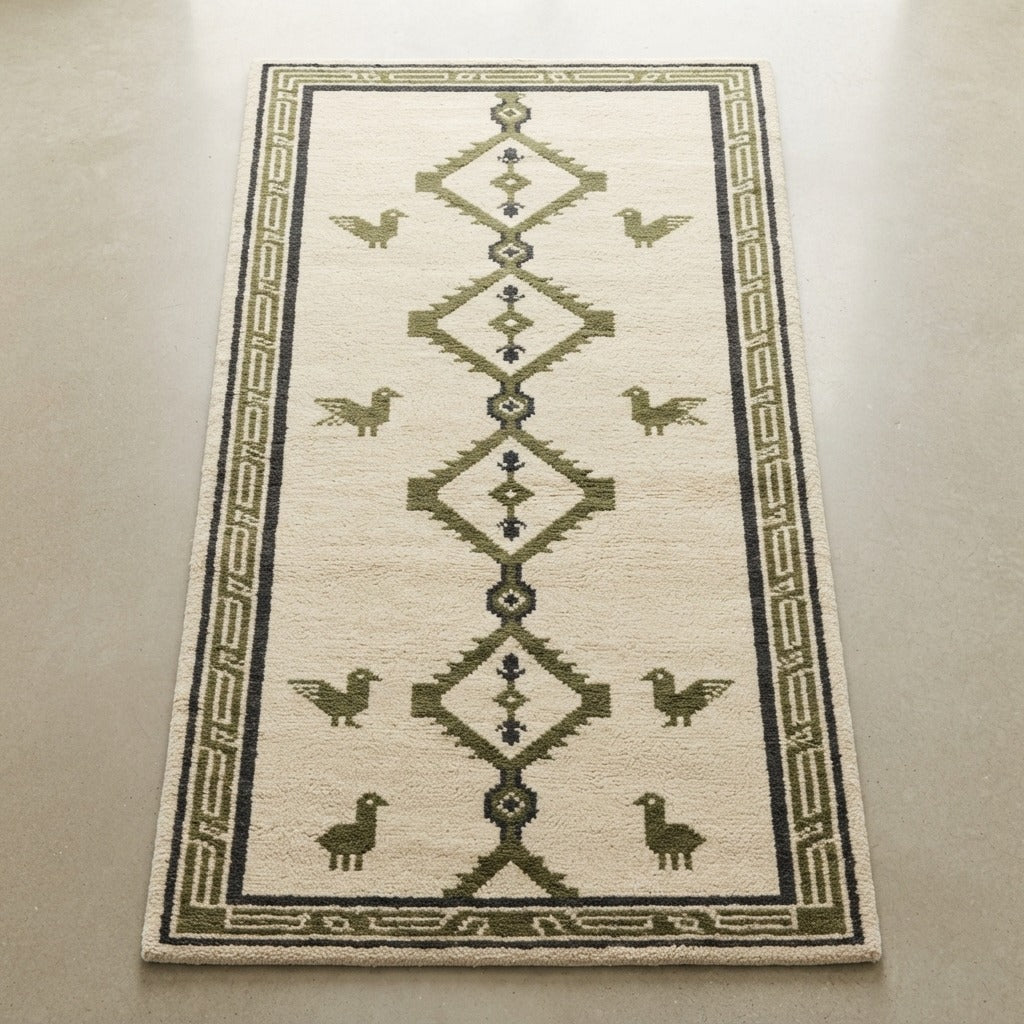 Ivory Tribal Diamond Hand-Tufted Rug with Olive Bird Motifs - studio photo