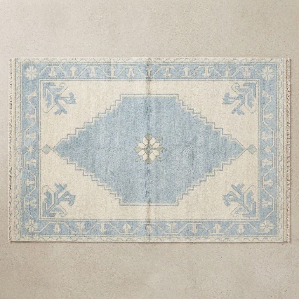 Ivory and Powder Blue Diamond Medallion Hand-Knotted Rug - studio photo