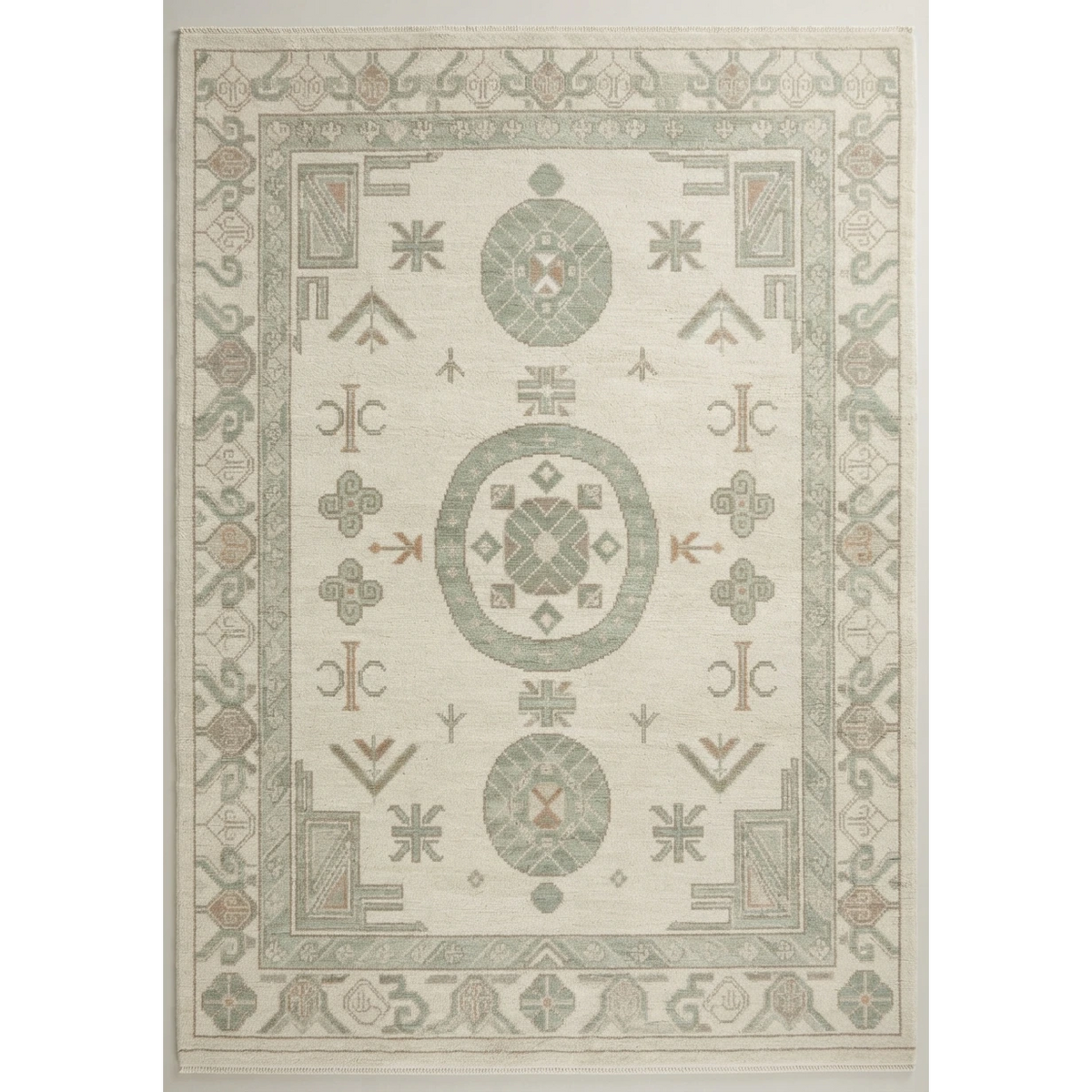 Ivory and Sage Chinese Medallion Hand-Knotted Rug with Geometric Border - studio photo