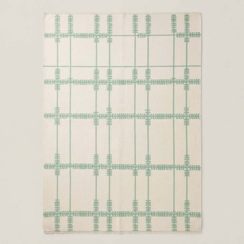 Ivory and Sage Grid Cotton Flat Weave Rug with Fern Motifs - studio photo