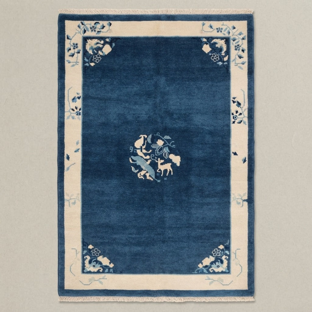 Navy Blue Chinese Art Deco Hand-Knotted Rug with Ivory Border - studio photo