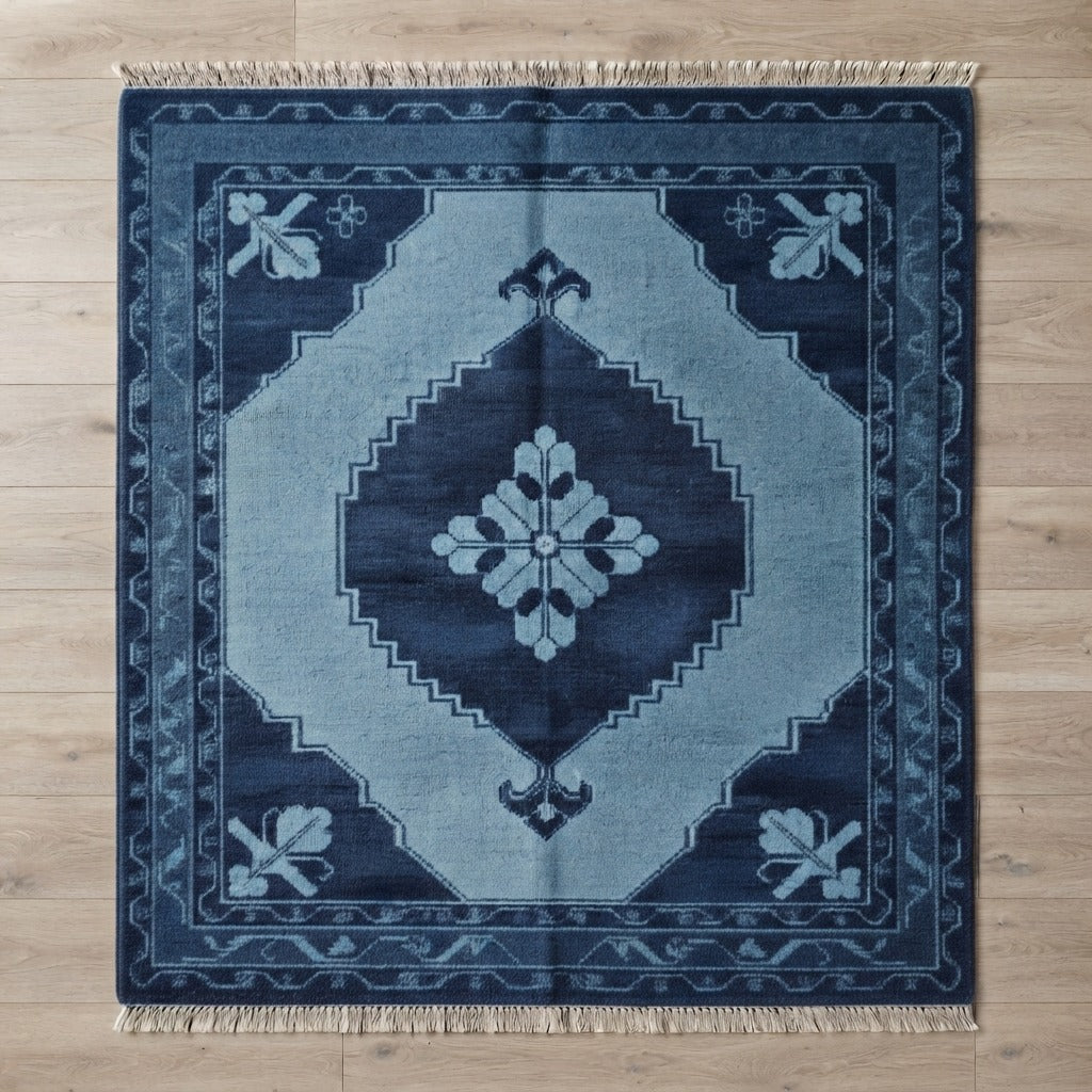 Navy and Sky Blue Diamond Medallion Hand-Knotted Rug - studio photo