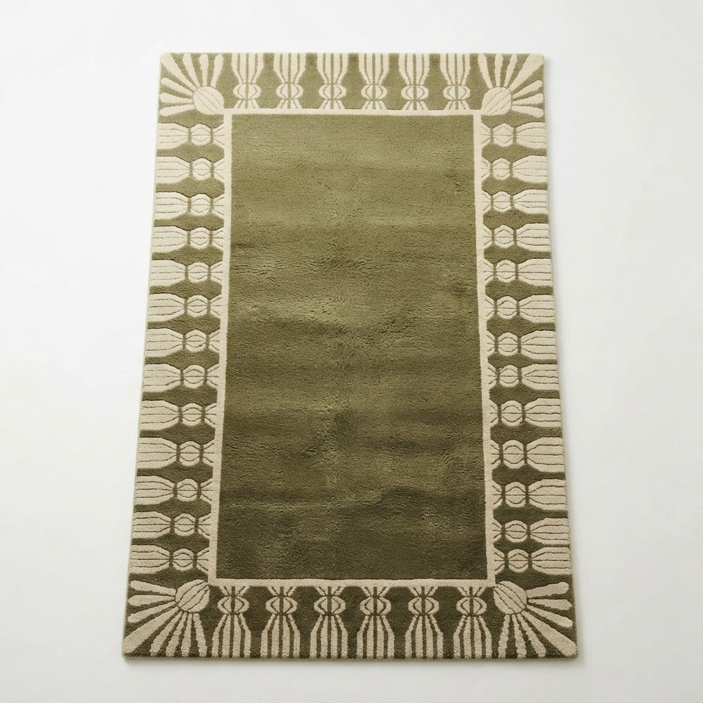 Olive Green Hand-Tufted Rug with Cream Fan Tassel Border - studio photo