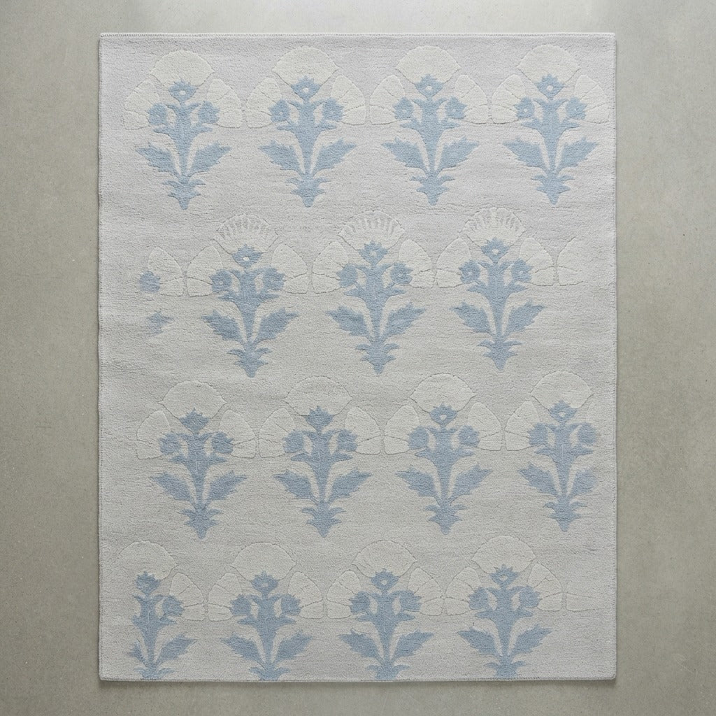 Pale Blue Hand-Tufted Rug with Cornflower Floral Sprig Rows - studio photo