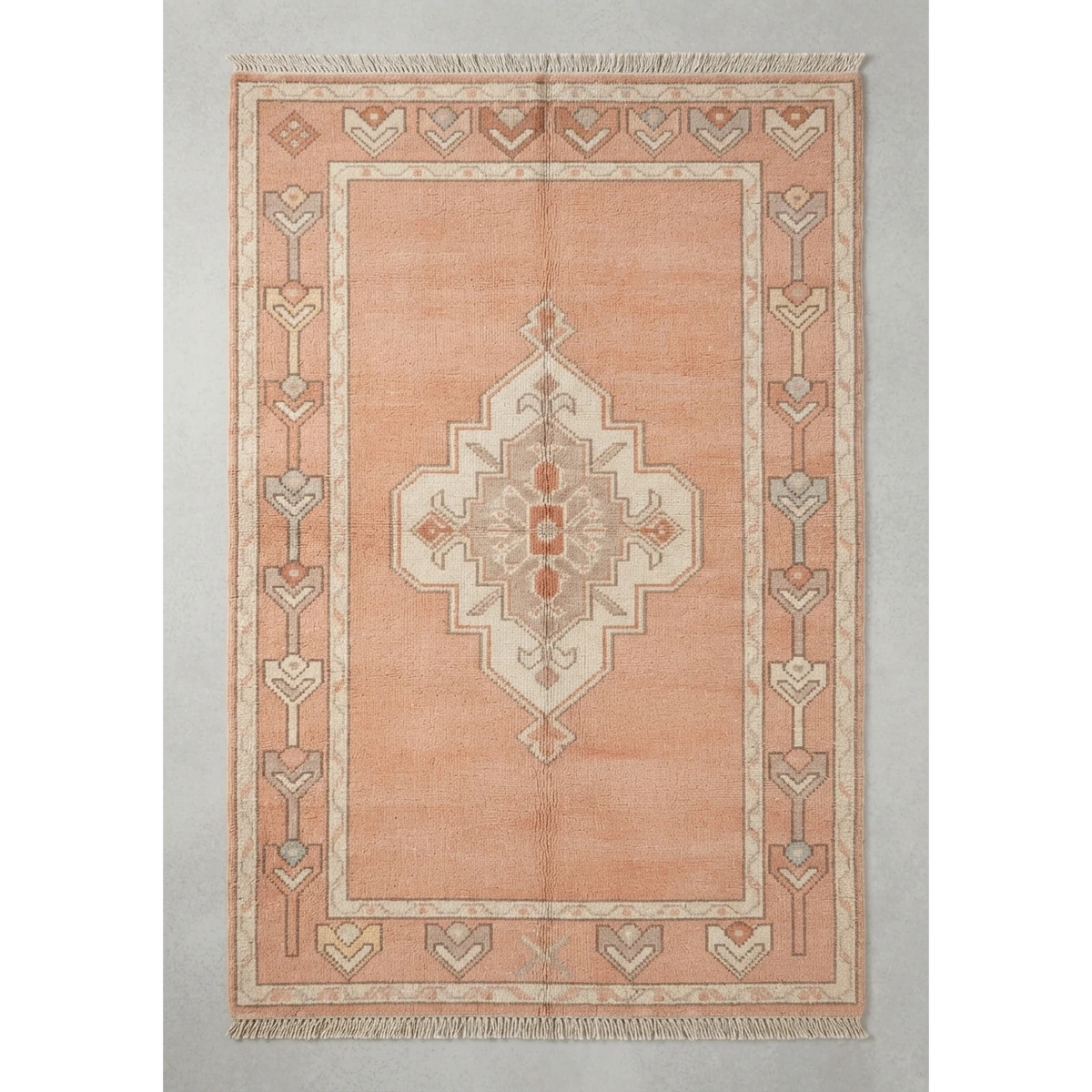 Peach Medallion Hand-Knotted Rug with Ivory Tulip Border - studio photo