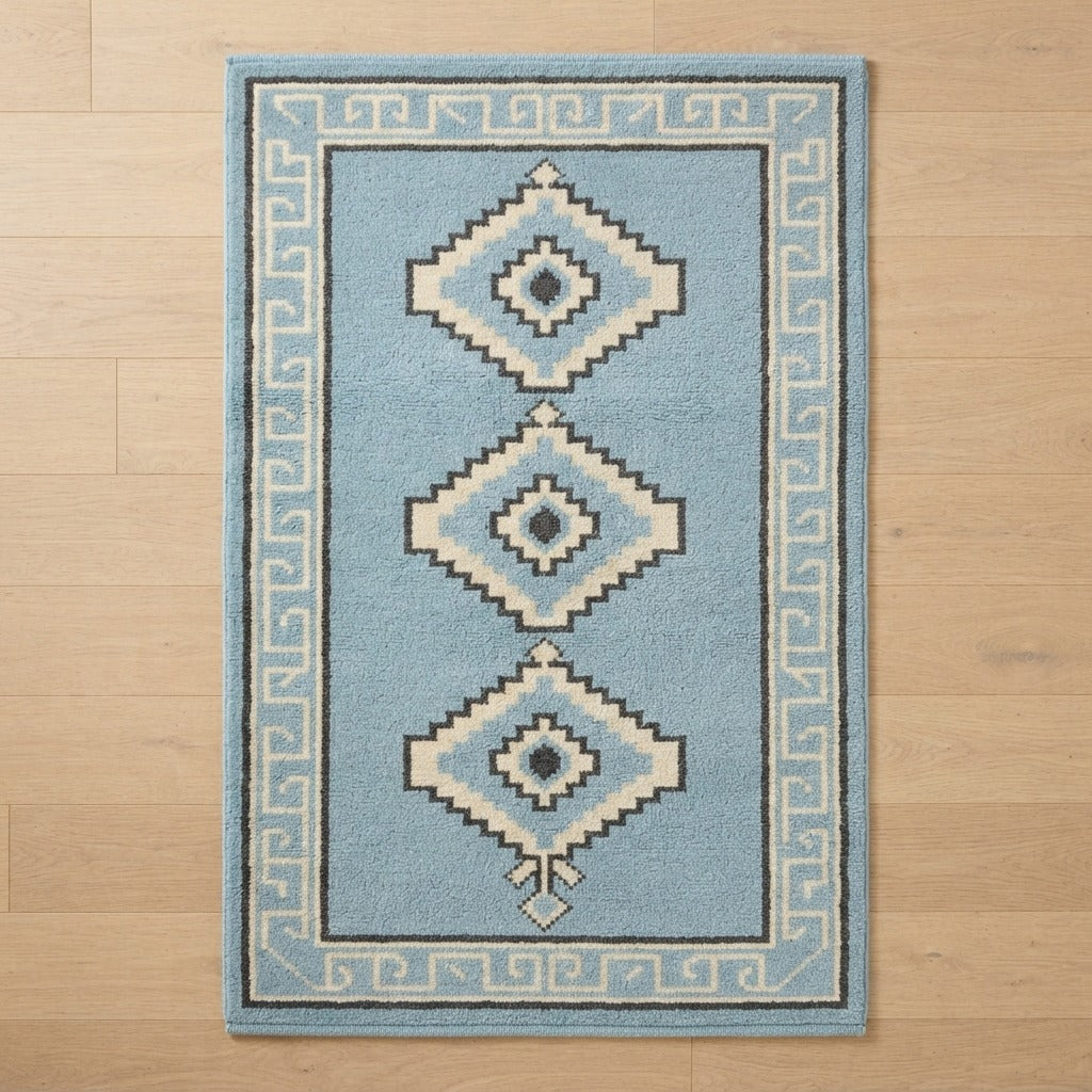 Powder Blue Tribal Diamond Hand-Tufted Rug with Charcoal Greek Key Border - studio photo