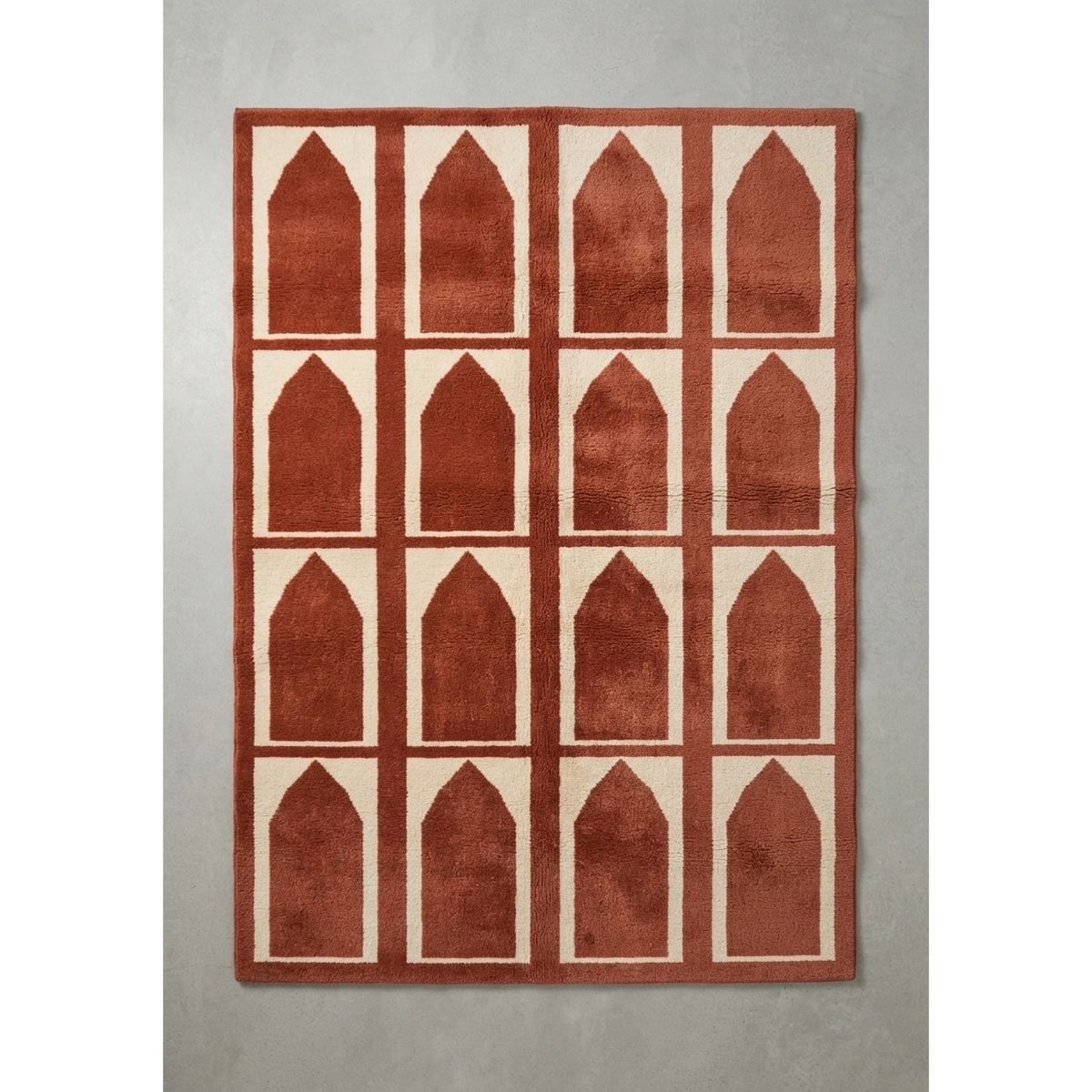 Rust and Ivory Arch Panel Hand-Tufted Rug - studio photo