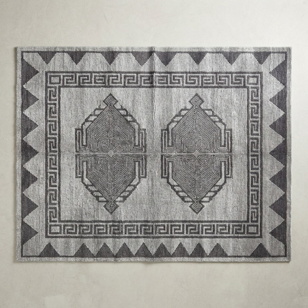 Silver Grey Tribal Hand-Tufted Rug with Charcoal Sawtooth Border - studio photo