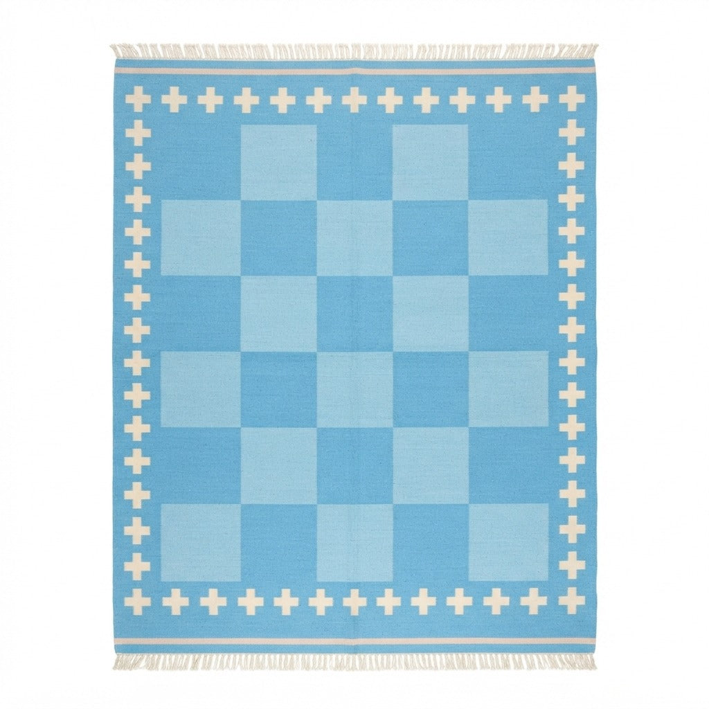 Sky Blue Checkerboard Cotton Flat Weave Rug with Ivory Cross Border - studio photo