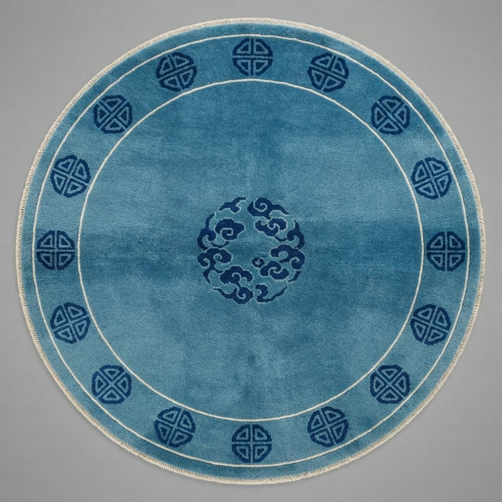 Teal Blue Round Hand-Knotted Rug with Navy Cloud Medallion - studio photo