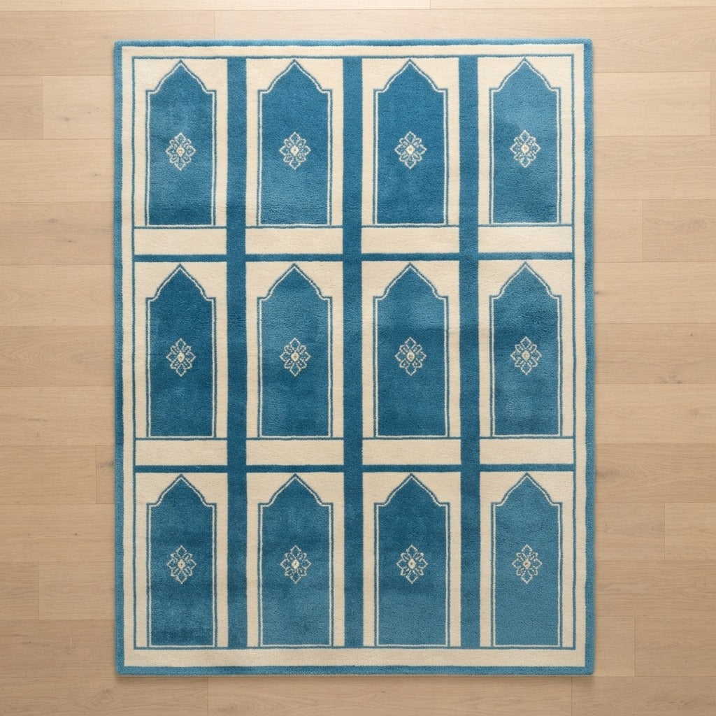 Teal Blue and Cream Hand-Tufted Rug with Arched Mihrab Panels - studio photo